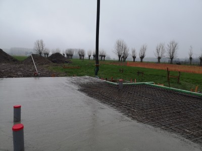 Farraillage et coulage d'une dalle de béton d'une maison unifamiliale