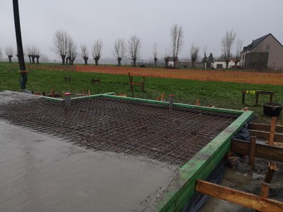 Farraillage et coulage d'une dalle de béton d'une maison unifamiliale